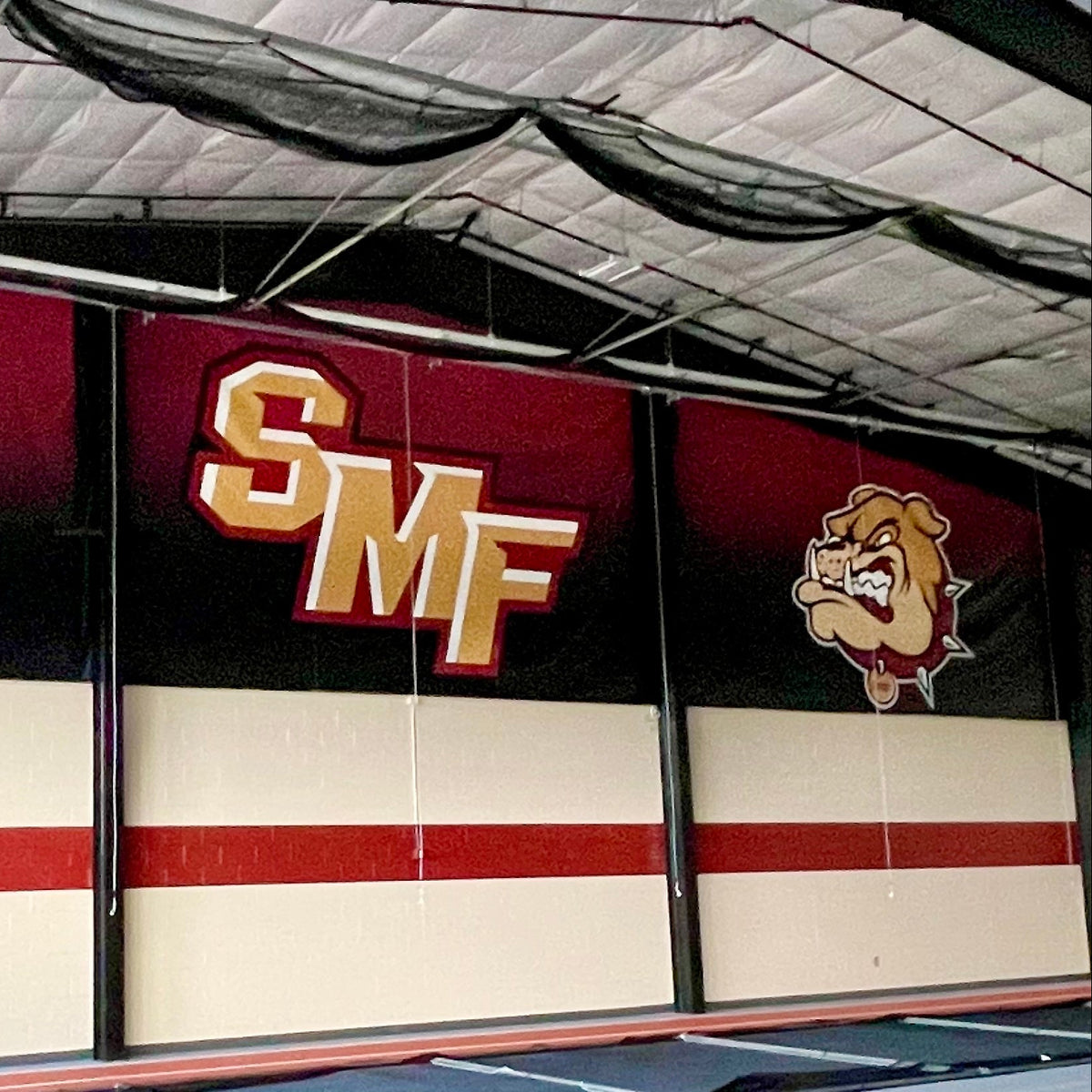 Set of e printed heavy duty banners made from 18oz banner material installed at the Stow-Munroe Falls High School Field House in Stow, OH