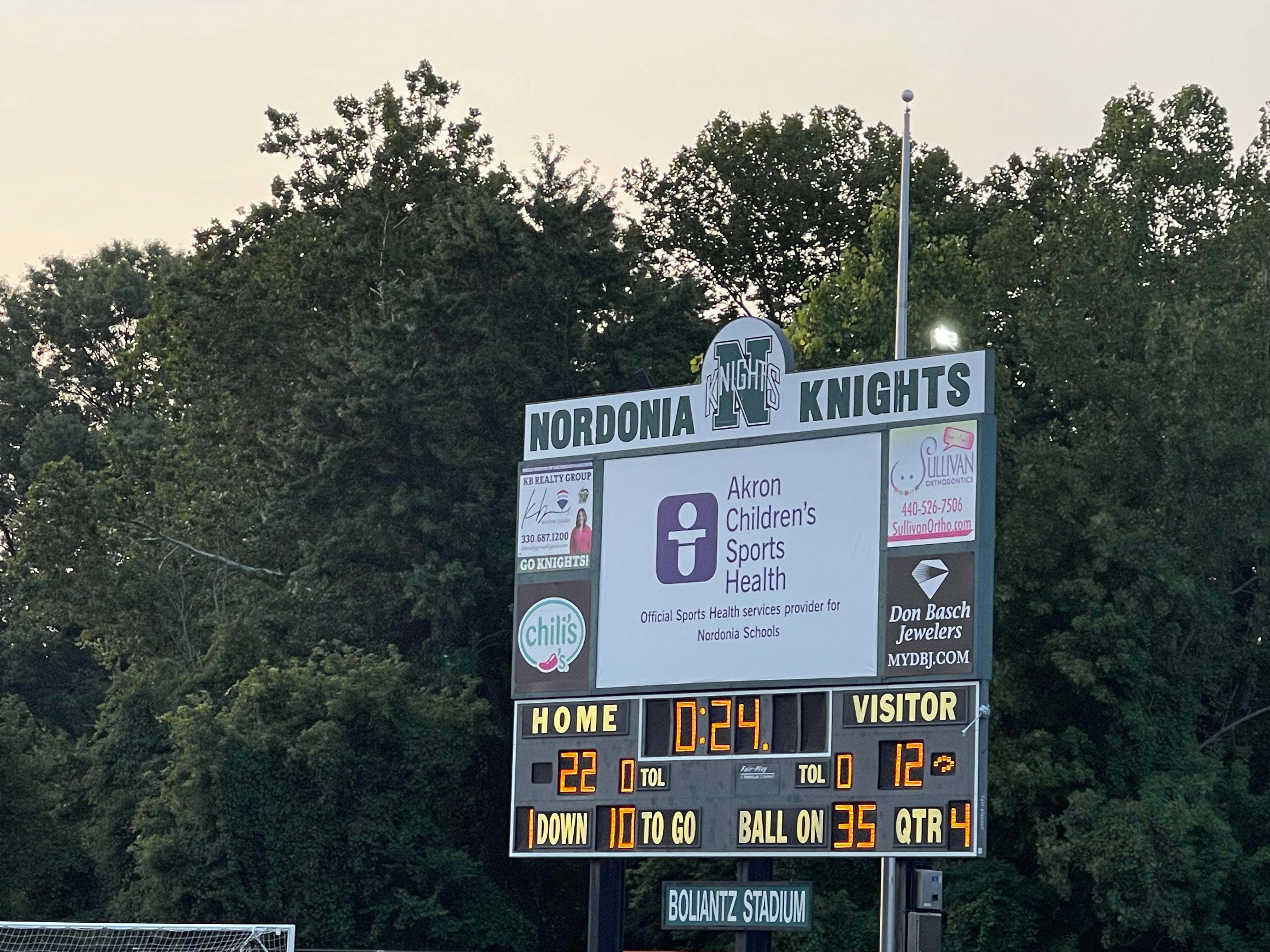 New 13 oz Banner iCompleted of installation on massive backlit scoreboard
