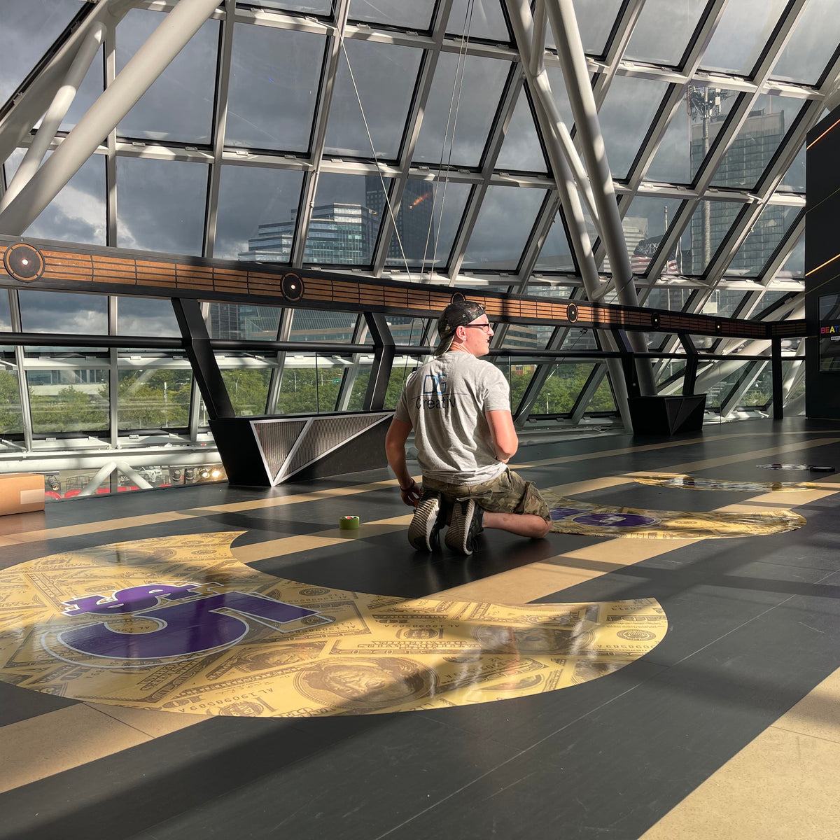 Custom slip-resistant floor graphics and wayfinding installed at the Rock and Roll Hall of Fame, Cleveland, Ohio.