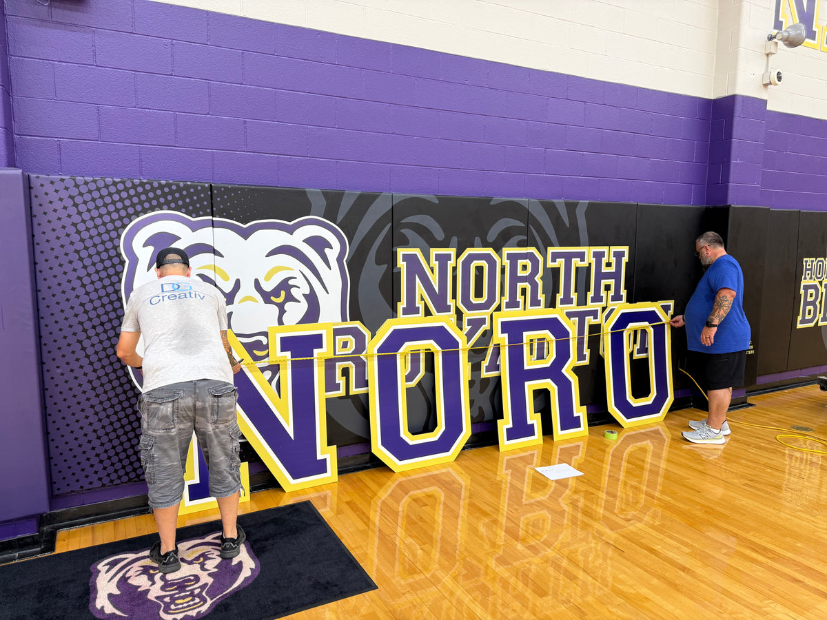 Massive 36-foot Noro Nation gym wall lettering cut from 6mm PVC Sintra using Zund CNC technology