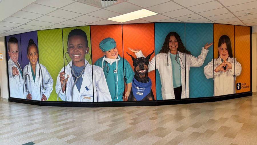 Printed architectural film running the full height of a thirty-foot interior glass wall at the Akron Children's Boardman location in Boardman, Ohio