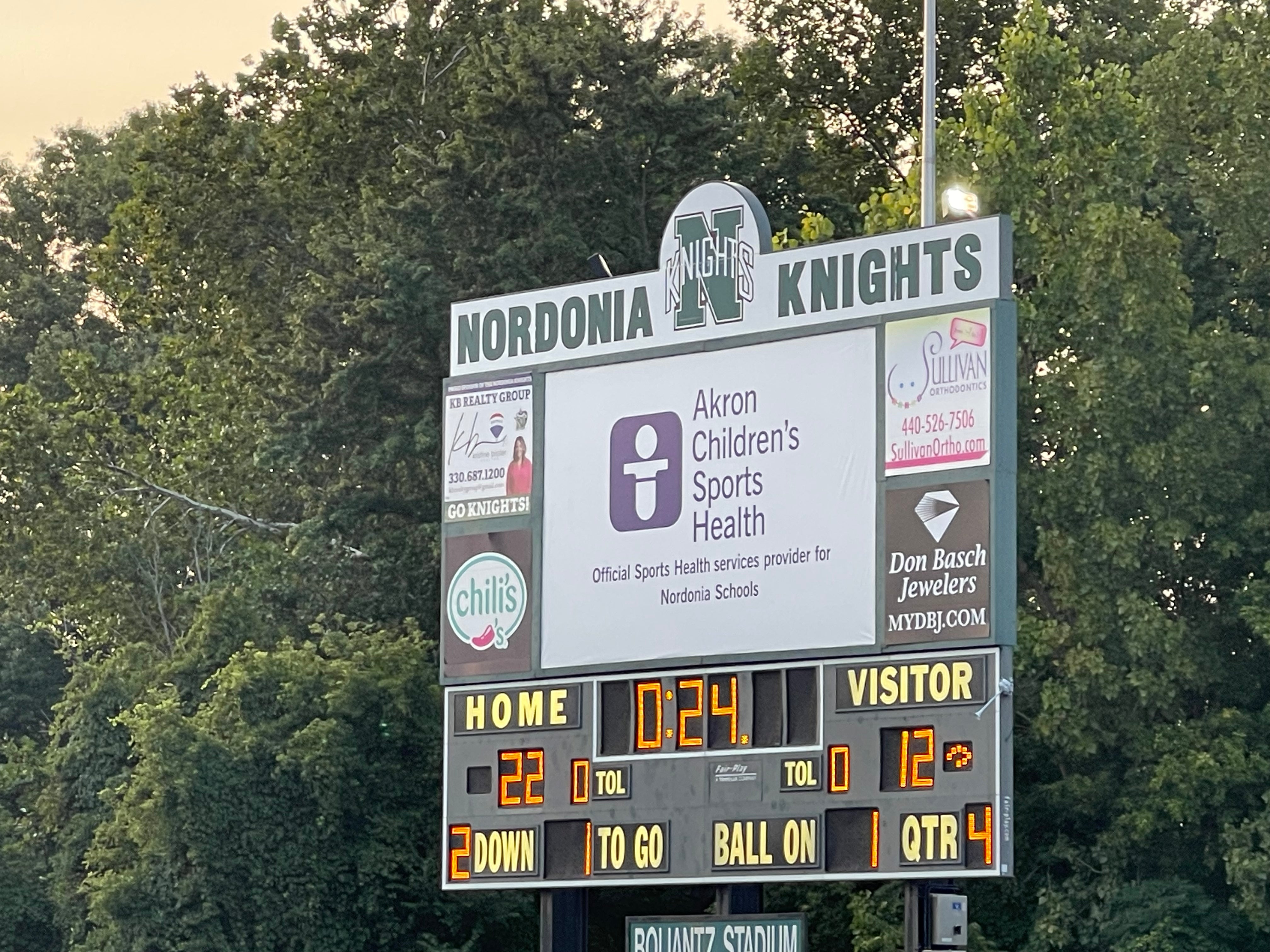 New 13 oz Banner iCompleted of installation on massive backlit scoreboard