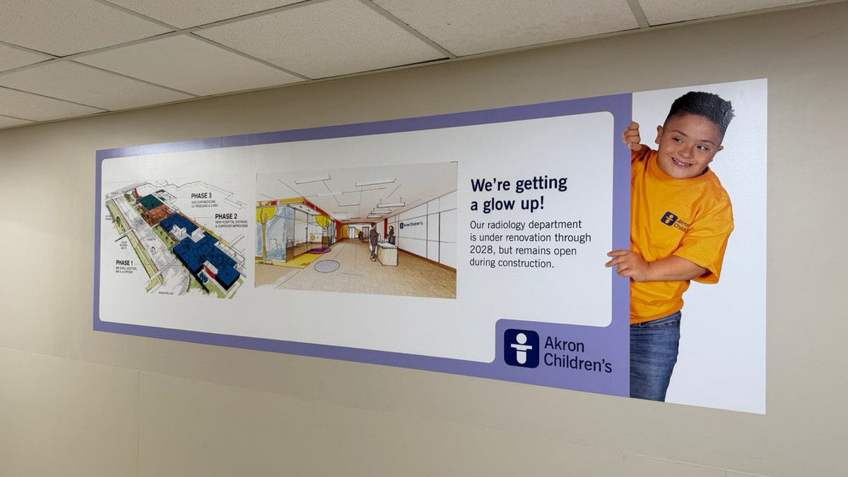 Full-coverage hallway wall mural promoting the upcoming Radiology Department construction.