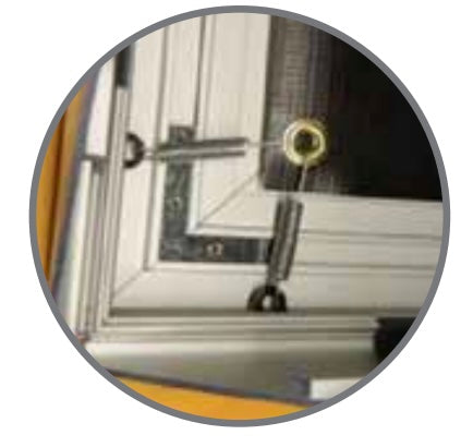 Internal spring-tensioning hardware for sag-free large format banners.