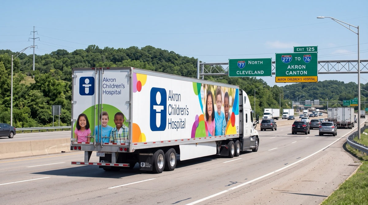 53-foot commercial mobile billboard trailer wrapped in custom fleet graphics traveling through Cleveland, Akron, and Columbus Ohio corridors