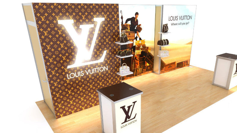 Louis Vuitton 10x20 inline trade show booth featuring an LED backlit wall display by DG Creativ
